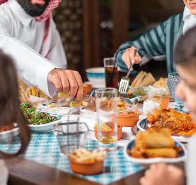 A family sharing an Iftar meal