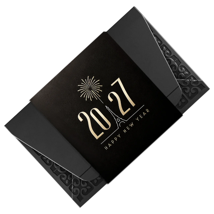 The closed New Year 2027 assortment box, gold foil sleeve